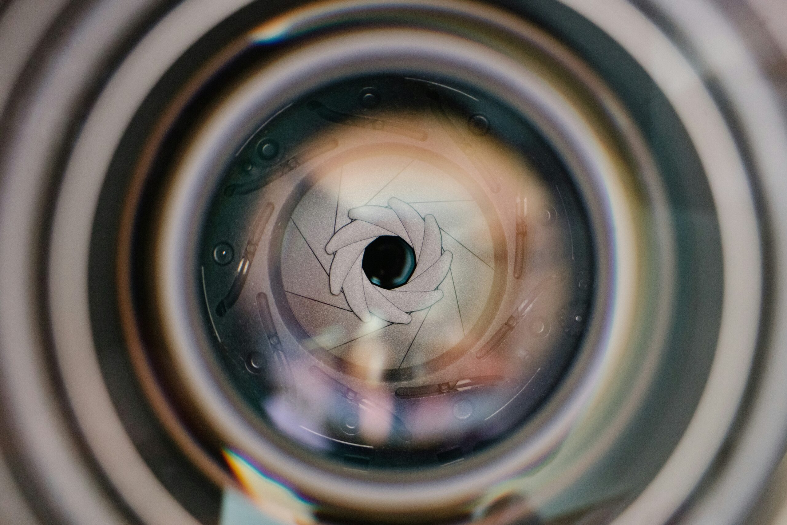 A cracked camera lens illustrating potential damage