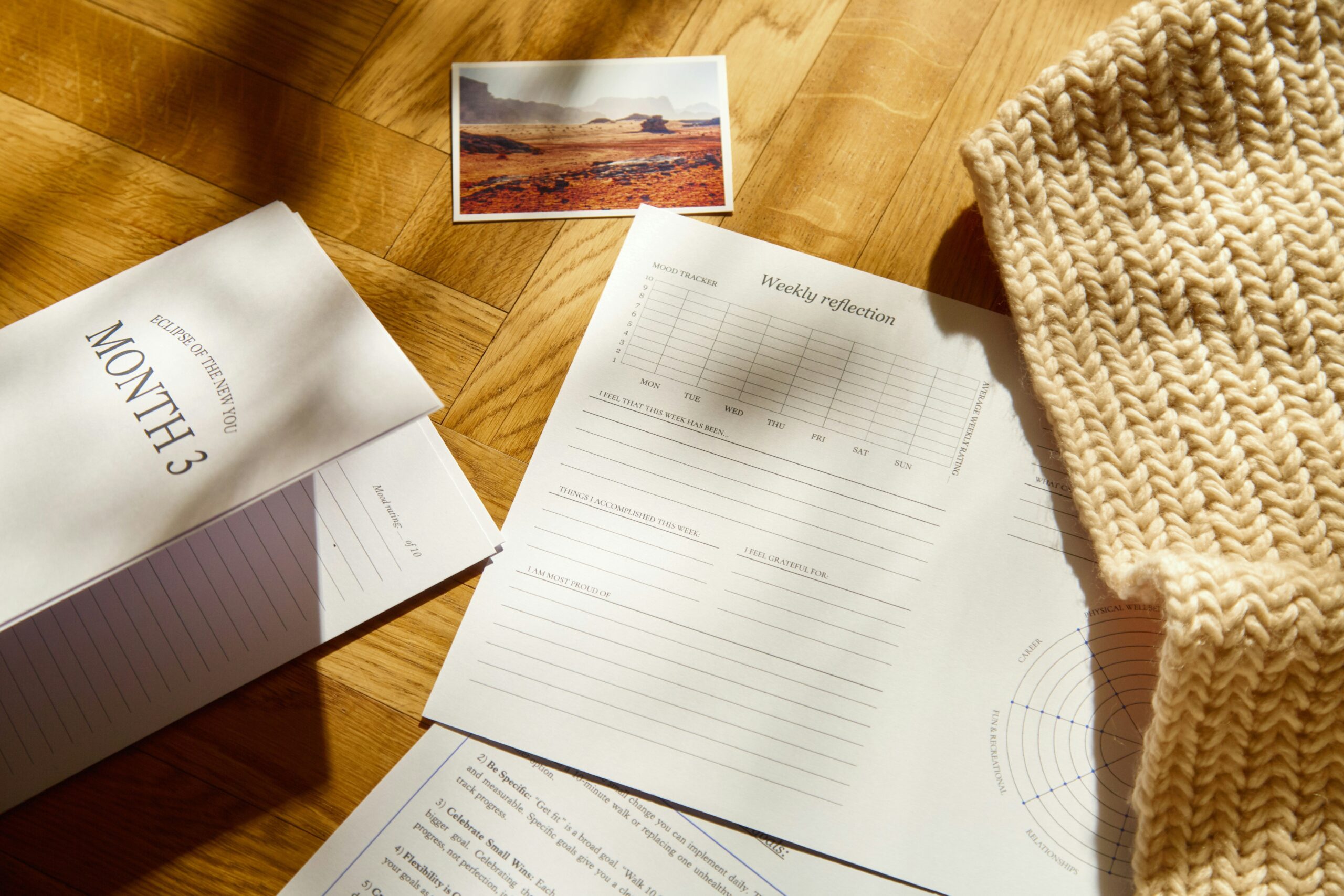 A frustrated photographer reviewing legal documents at their desk