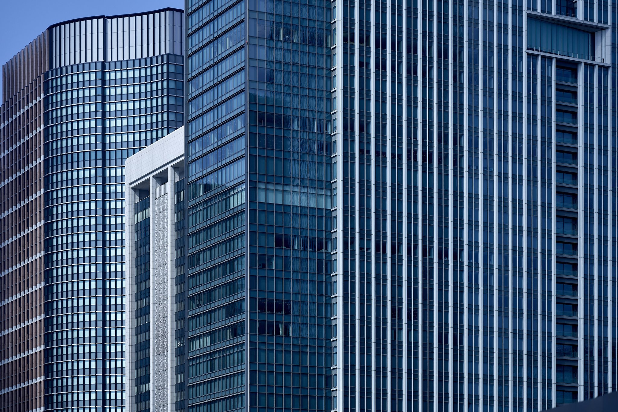 Comparison table of three popular insurance providers offering professional liability plans