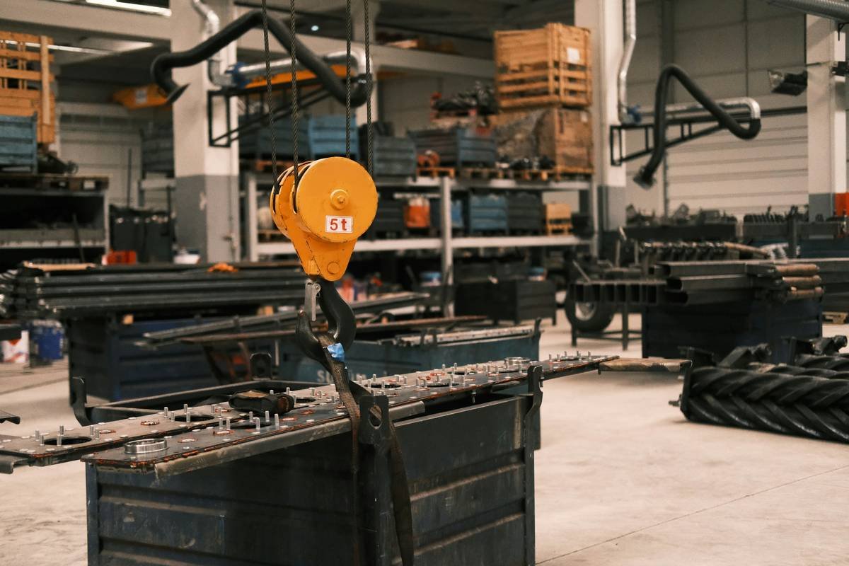 A damaged camera lens lying on the floor