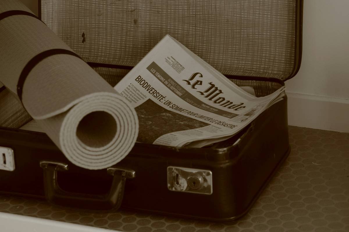 A lawyer holding up legal documents symbolizing potential legal issues